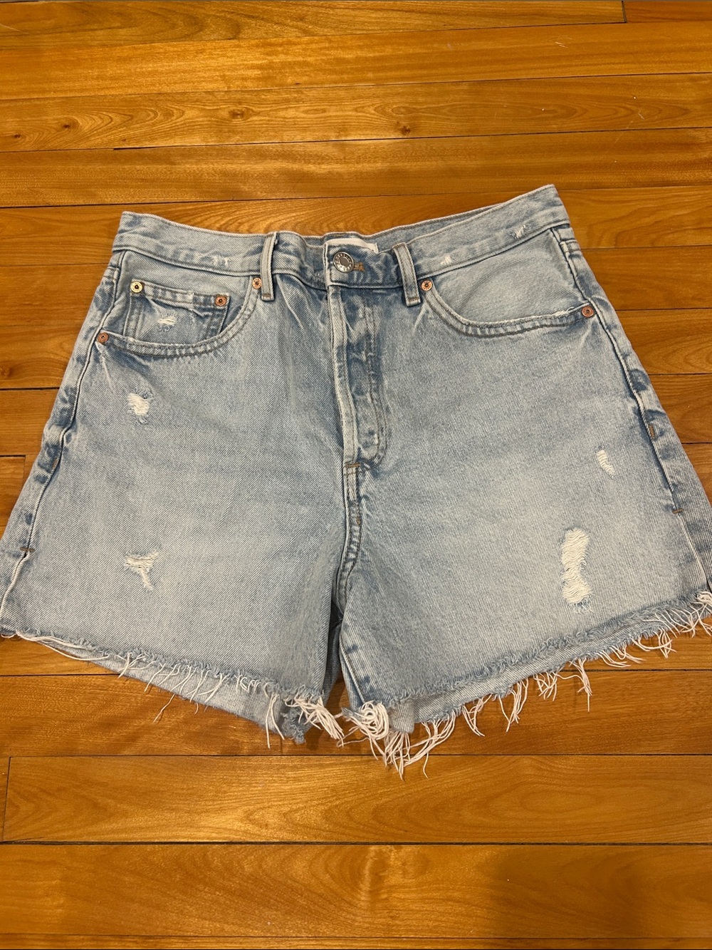 High-Rise Light Blue Distressed Denim Shorts